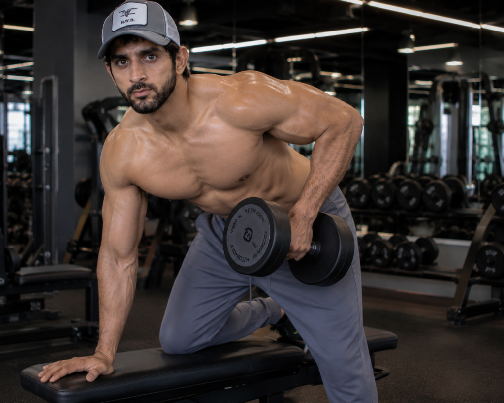 Fan-made Fazza workout picture performing a one-arm dumbbell row